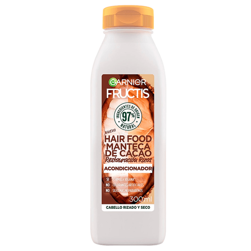 Acondicionador Garnier Fructis Hair Food Manteca de Cacao para cabello rizado. Gracias a su fórmula con un 96% de origen vegetal, el cabello quedará saludable, nutrido y libre de frizz.