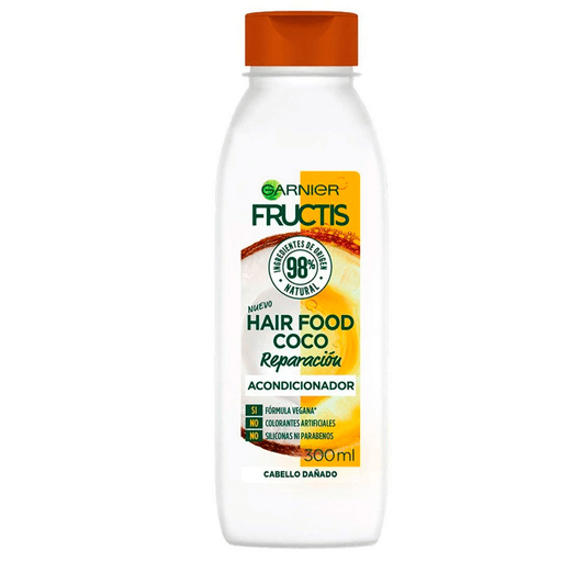 Acondicionador Fructis Hairfood con coco para pelo dañado y con 98% de Ingredientes de origen natural.
