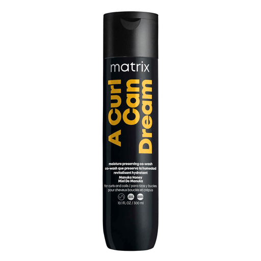 Matrix A Curl Can Dream Co-Wash es un acondicionador limpiador para cabello rizado, enriquecido con miel de Manuka. Limpia suavemente, revitaliza los rizos y ayuda a mantener su definición natural.