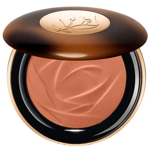 Teint Idole Ultra Wear CE Skin Transforming Bronzer es un polvo bronceador de aspecto saludable que dura 24 horas infundido en suero. Deja la piel luminosa, como dorada por el sol, para un cutis bronceado perfecto.