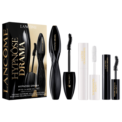 El cofre Lancôme Hypnôse Drama es el set ideal para lograr una mirada intensa y de alto impacto desde el primer uso. Incluye la icónica máscara Hypnôse Drama en tamaño regular y mini, reconocida por aportar hasta 17 veces más volumen con un color negro profundo y una cobertura uniforme desde la raíz hasta las puntas, junto con el primer de pestañas Cils Booster, que prepara, alarga y acondiciona las pestañas para potenciar al máximo el efecto de la máscara. Este combo permite conseguir pestañas más densas, largas y definidas, con un acabado profesional y de larga duración, perfecto tanto para el día a día como para ocasiones especiales. 